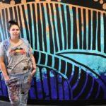 Vibrant mural centre stage of Indigenous lounge makeover