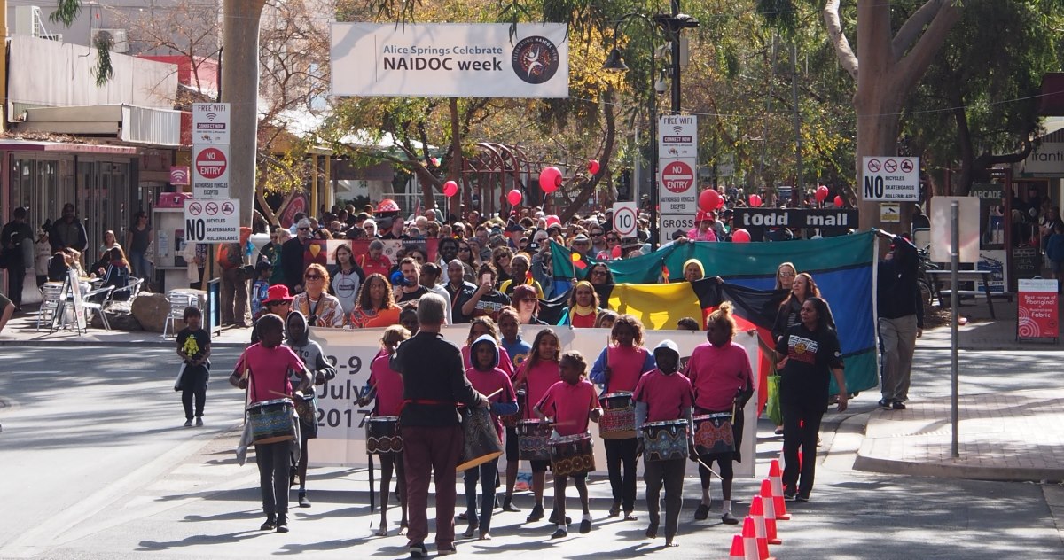 NAIDOC March with Peter Lowson OA leading Drum Atweme