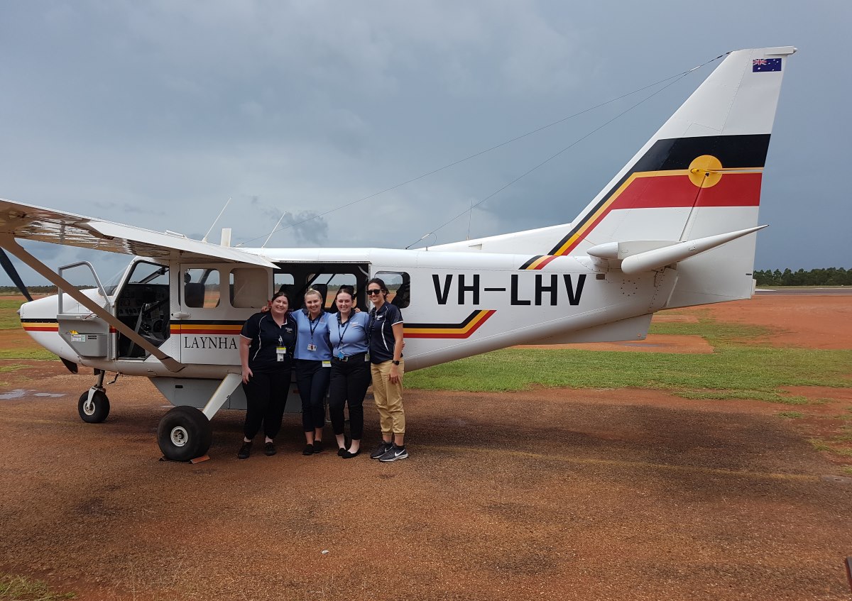 Bethany Bailey (SP student), Maddison Cappler (OT student), Jessica Garard (OT student) and Shannon Day (SP student) en route to Gan Gan with Laynhapuy Air as part of their clinical placement with Flinders NT