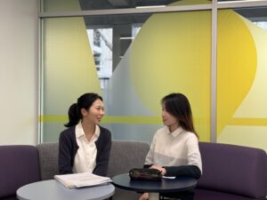 Flinders Academy student and staff sitting and talking