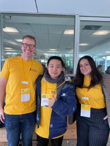 Flinders University International student ambassador smiling with staff