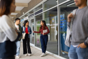 Flinders University Academy students walking around the Bedford Park campus