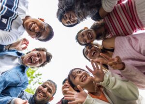 Group of Flinders students smiling in a circle