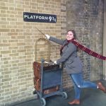 Boarding the Hogwarts Express through platform 9 3/4 at Kings Cross Station in London