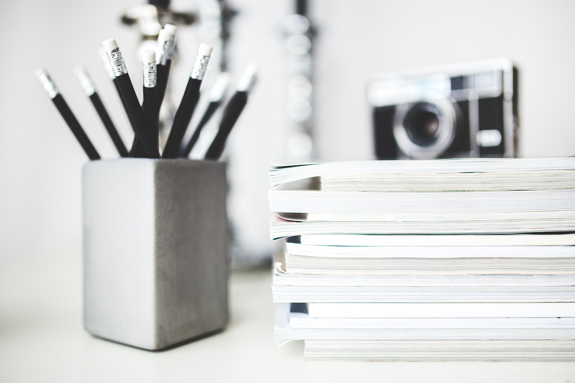 Black and White pencils in a pot